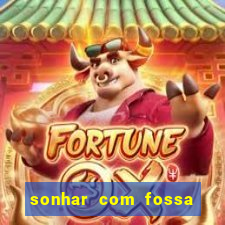 sonhar com fossa de fezes cheia